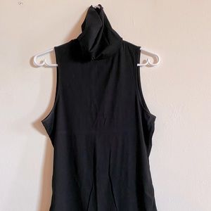 Black sleeveless turtleneck